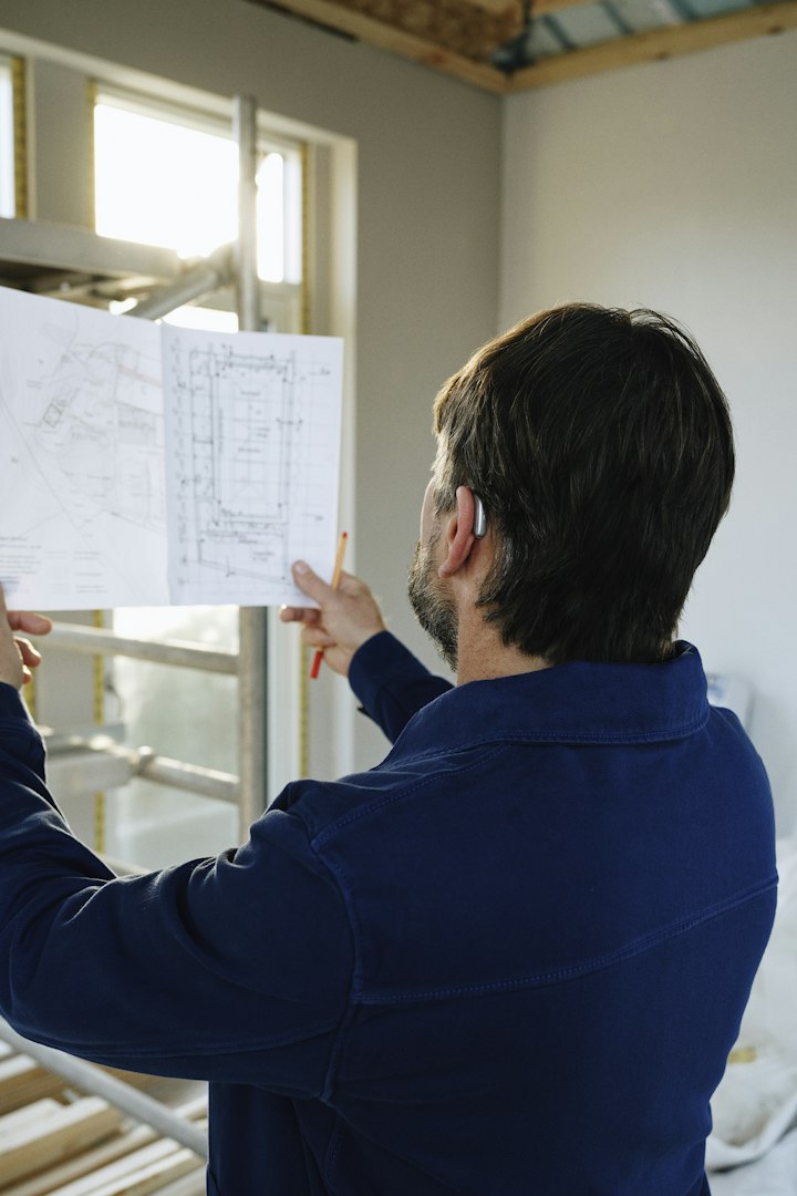 Engineer reviewing project drawings