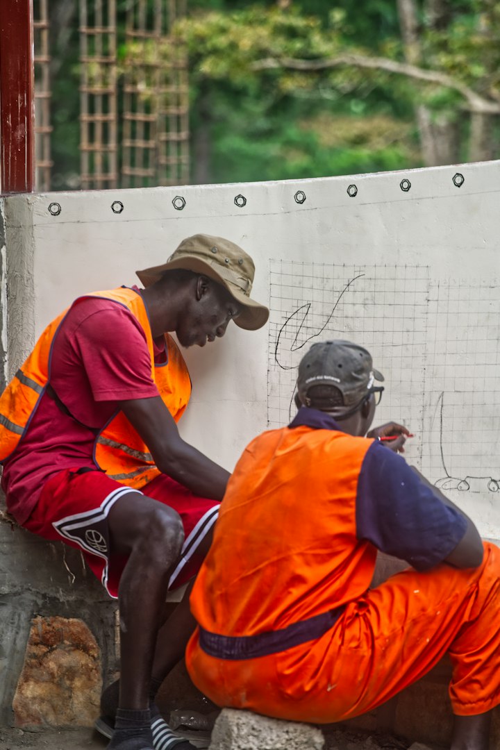 Construction team reviewing technical drawings